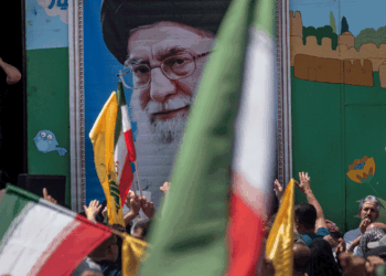 Supreme Leader Ayatollah Ali Khamenei image on the wall during a pro-Iran demonstration