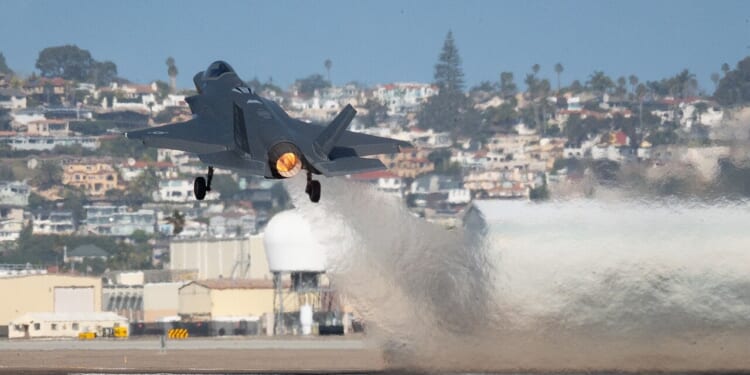An F-35 fighter taking off.