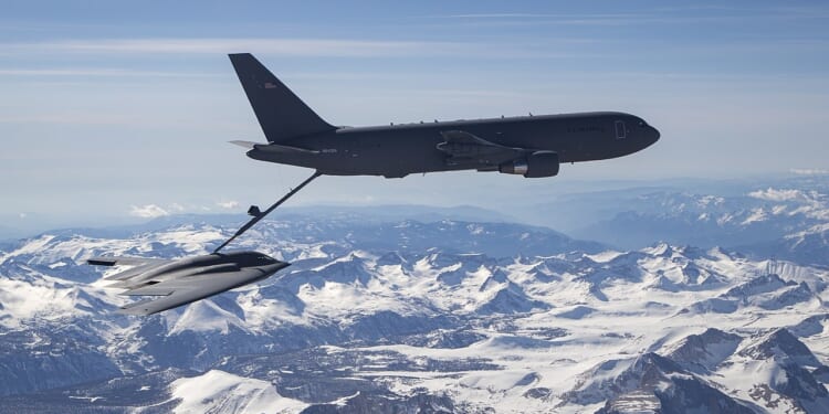 A B-2 Spirit refueling in midair.
