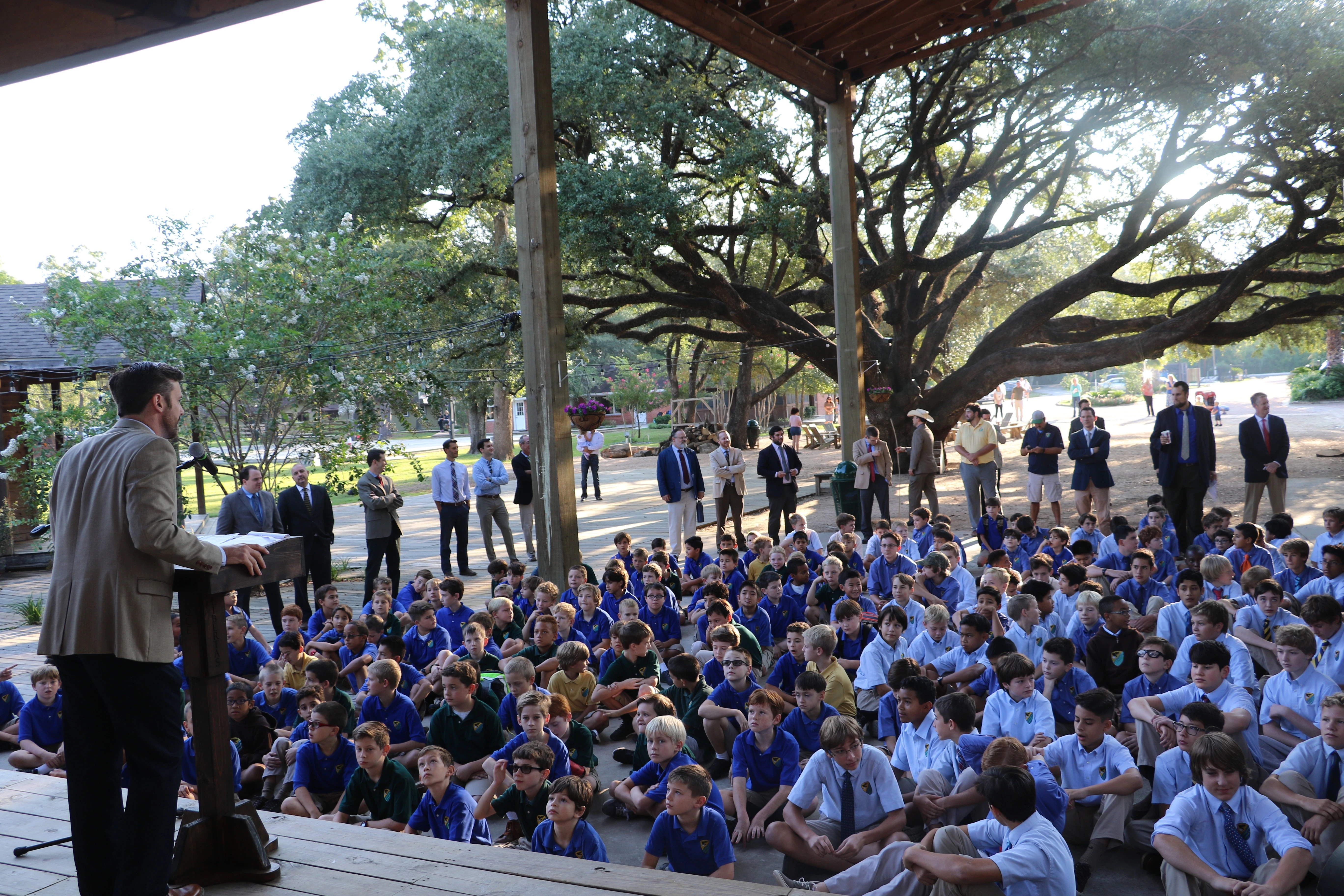 Western Academy's headmaster, Jason Hebert, speaks to the boys on the first day of school as the faculty looks on. Credit: Courtesy of Western Academy