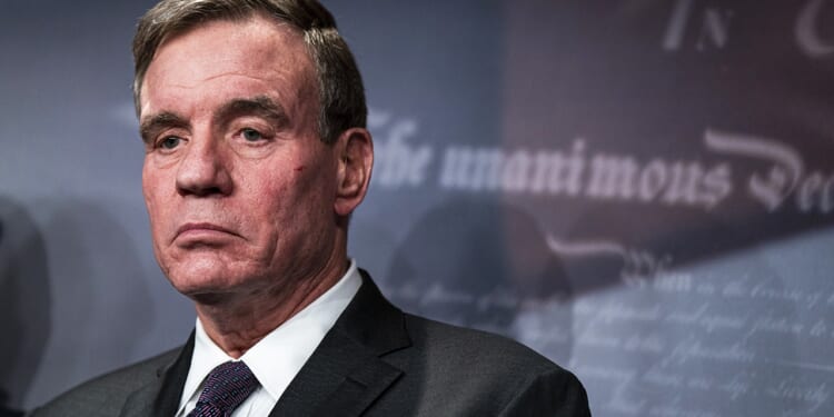 Warner silent on whether Jay Jones should drop out over murder texts