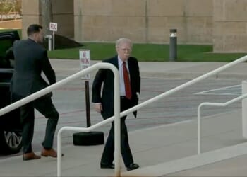 John Bolton surrenders to face charges of sharing classified information