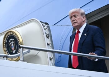Trump uses small stairs on Air Force One after hunting stand found nearby