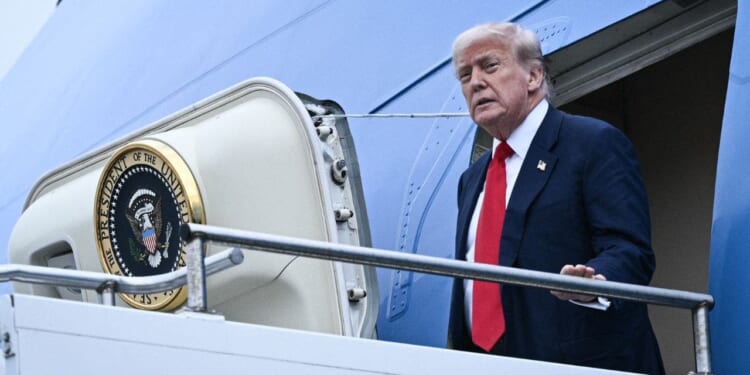 Trump uses small stairs on Air Force One after hunting stand found nearby