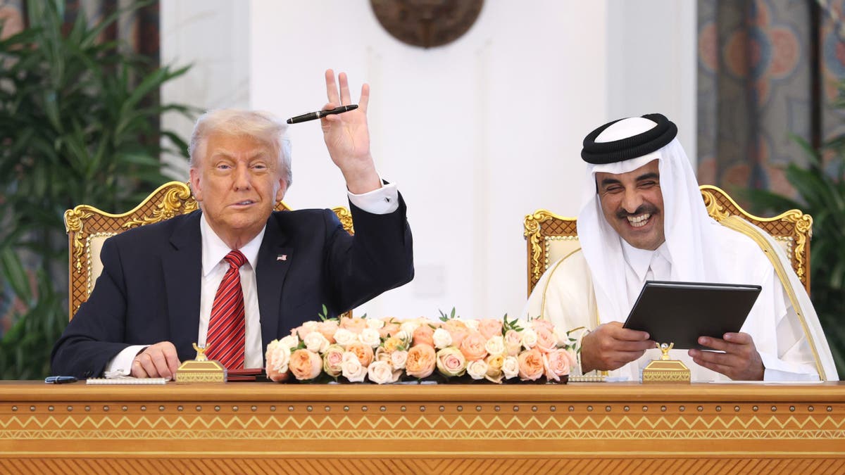 President Donald Trump and Emir of Qatar Tamim bin Hamad al Thani in Doha, Qatar in May 2025.