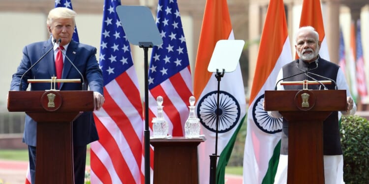 Donald Trump and Narendra Modi speak at a joint press conference.