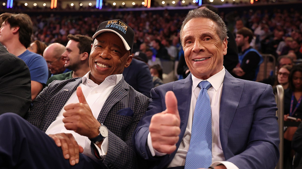 Adams and Cuomo give thumbs up courtside at NY Knicks Game