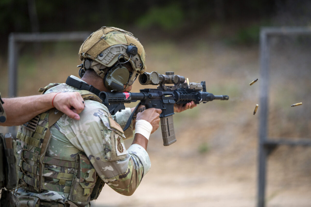 A U.S. Air Force Staff Sgt. Lawrence Durr, assigned to the 186th Security Forces Squadron, shoots an M4 carbine during exercise Sage Eagle 25-4 at Fort A.P. Hill, Virginia, August 21, 2025.