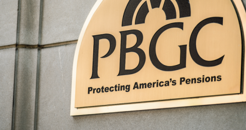 Signage of the Pension Benefit Guaranty Corporation (PBGC) emphasizing its mission to protect American pensions.