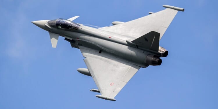 Italian Air Force Eurofighter Typhoon fighter jet aircraft in flight. Florennes, Belgium - June 15, 2017