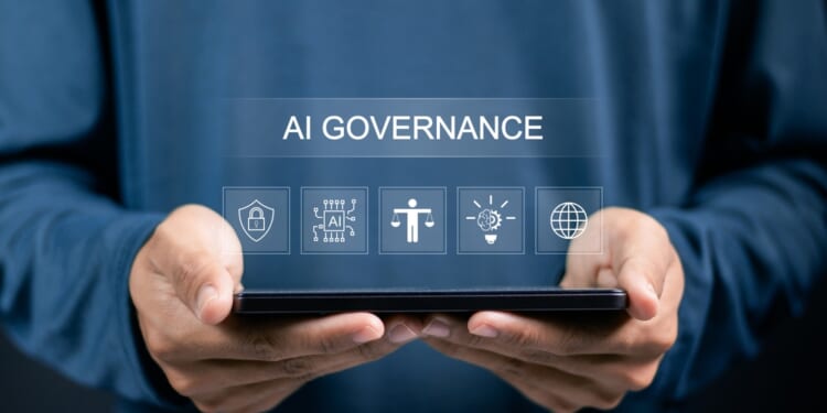 AI, Artificial Intelligence governance concept. Artificial intelligence law. Person showing Ai governance icon on virtual screen for compliance, regulation, standard, AI policy and responsibility