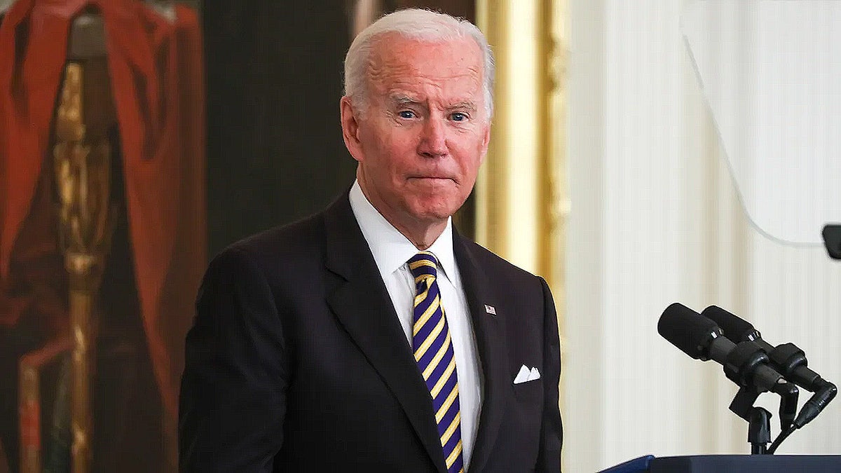 Former President Joe Biden at a podium
