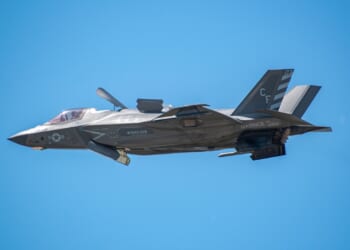 An F-35B fighter jet in flight.