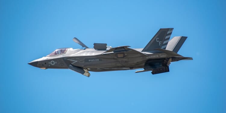 An F-35B fighter jet in flight.