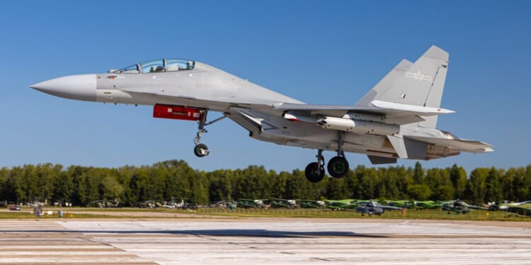 Shenyang J-16 jet fighter of People's Liberation Army Air Force seen landing at Dyagilevo airfield during Aviadarts contest.