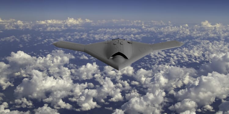 A stealth bomber drone in flight.