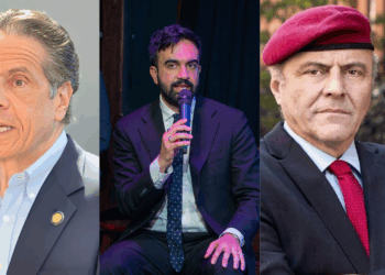 Three men in suits, one speaking into a microphone, showcasing diverse expressions and styles during a public event.