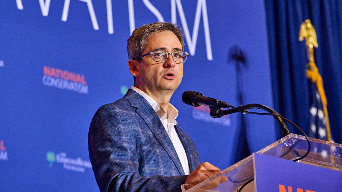 Oren Cass speaking at an event