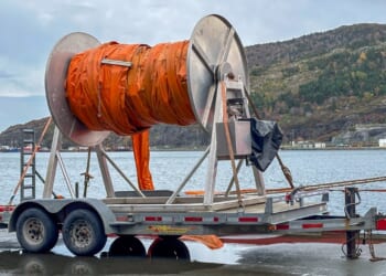 An undersea cable being laid.