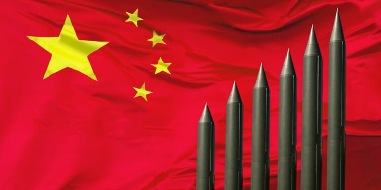 A Chinese flag with missiles.