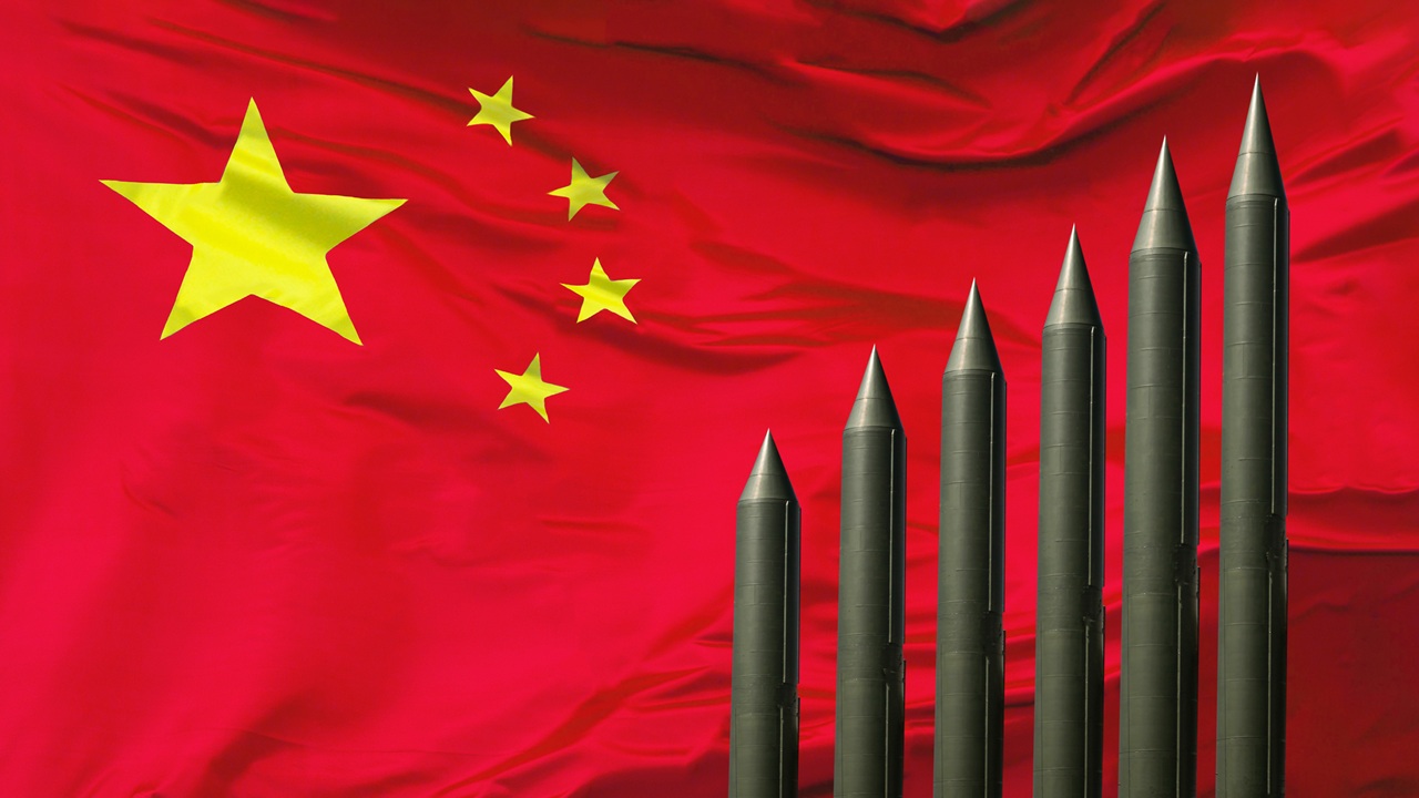 A Chinese flag with missiles.