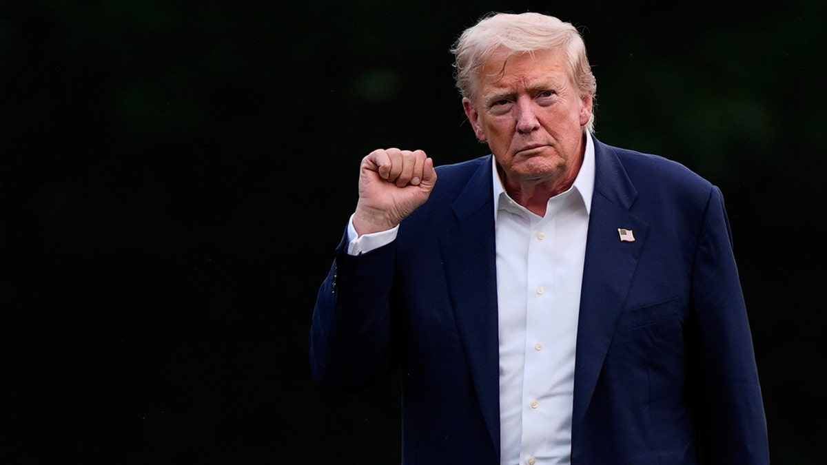 Donald Trump arrives back at the White House