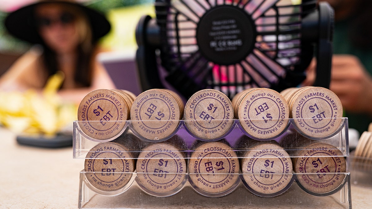 Electronic Benefit Transfer (EBT) tokens on display.