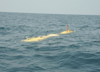 A yellow underwater drone.