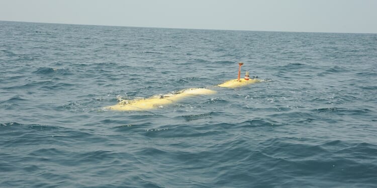 A yellow underwater drone.