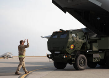 Personnel from the Romanian Land Forces 8th Tactical Operational Missile Brigade and the U.K. Royal Air Force practice loading and unloading the High Mobility Artillery Rocket System (HIMARS) on a U.K. A400M during a dry-fire exercise as part of the ATREUS exercise series on Nov. 8, 2022, at Mihail Kogălniceanu Airbase, Romania.