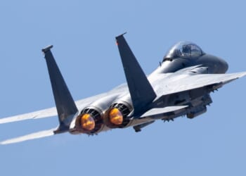 Tail view of a F-15 Eagle with afterburners on.