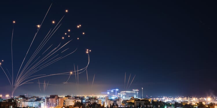 Israel's Iron Dome firing rockets at incoming missiles.