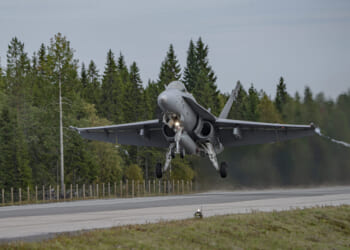 A Finnish Air Force F/A-18 Fighter Jet taxis out during the Exercise BAANA 2024, on Hosio Highway, Ranua, Finland, Sept. 04.