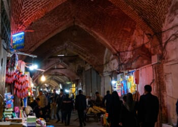 People walk through marketplace in Tabriz, Iran.