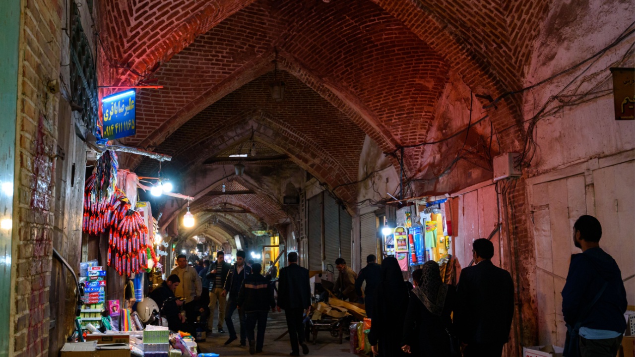 People walk through marketplace in Tabriz, Iran.