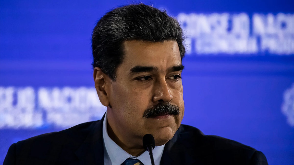 President of Venezuela Nicolas Maduro looks on during a meeting