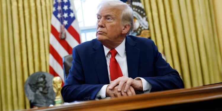 President Donald Trump at the Resolute desk.