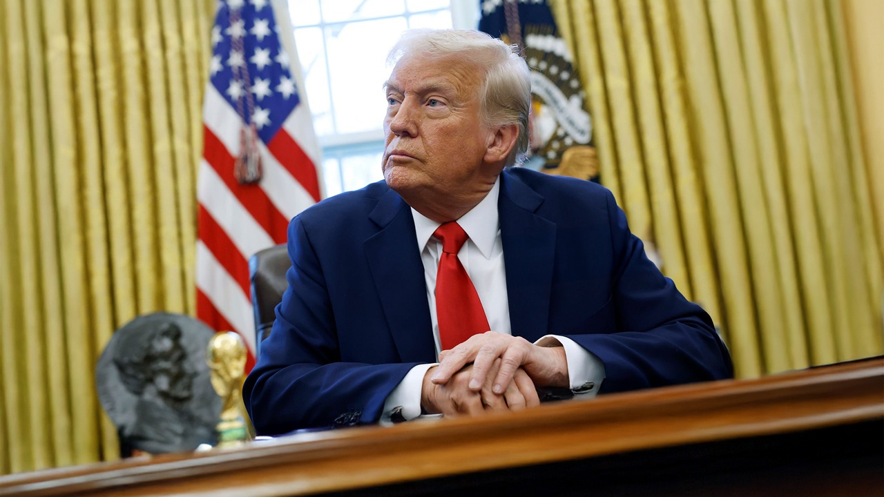 President Donald Trump at the Resolute desk.