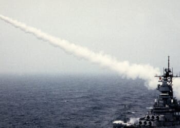 A US Navy ship firing a Tomahawk missile.