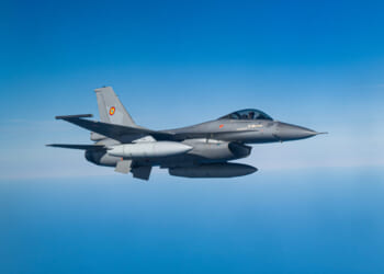 A Romanian air force F-16 Fighting Falcon flies alongside a KC-135 Stratotanker from the 100th Air Refueling Wing, RAF Mildenhall, England, during air refueling operations in exercise Ramstein Flag 25 over the North Sea, March 31, 2025.