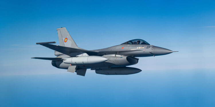 A Romanian air force F-16 Fighting Falcon flies alongside a KC-135 Stratotanker from the 100th Air Refueling Wing, RAF Mildenhall, England, during air refueling operations in exercise Ramstein Flag 25 over the North Sea, March 31, 2025.