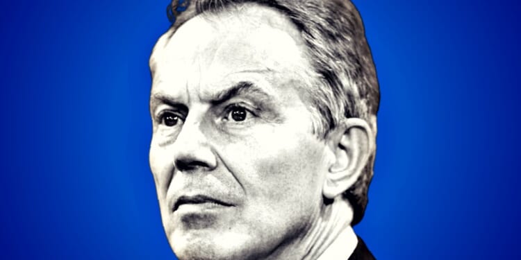 Portrait of a serious man against a blue background, showcasing intense expression and thoughtful demeanor.