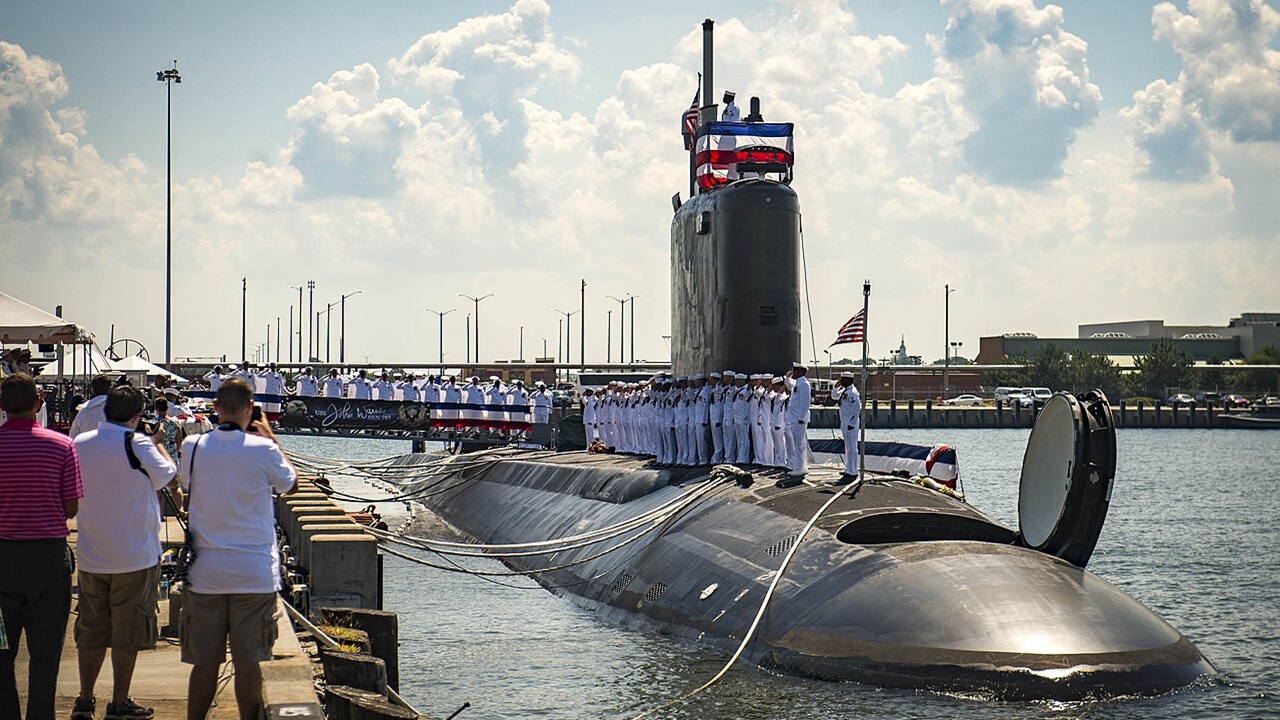 A submarine being commissioned.
