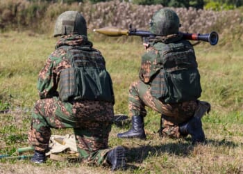 A soldier shoots an RPG-7.