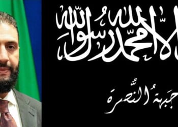 Portrait of a man with a beard and formal attire, alongside Arabic calligraphy featuring religious phrases, symbolizing faith and identity.