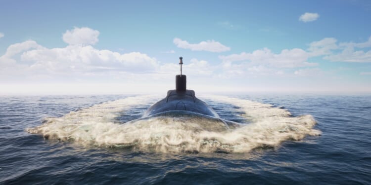 A submarine partially submerged.