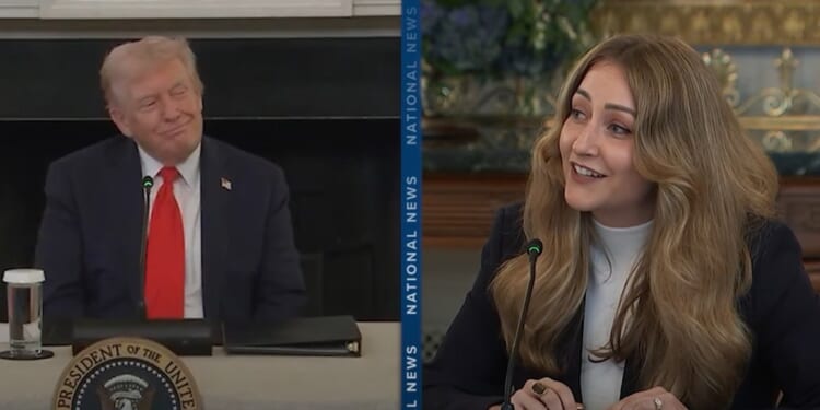 Donald Trump and a woman speaking during a discussion at a presidential event, both engaged and smiling, emphasizing a collaborative atmosphere.