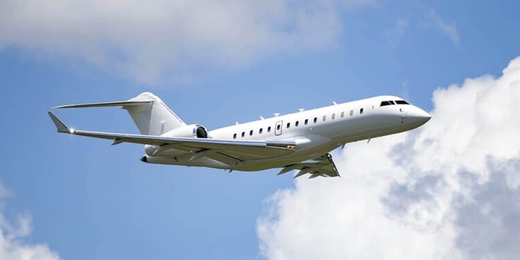 A Bombardier 6500 jet in flight.