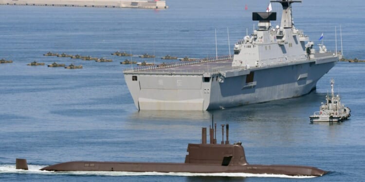 South Korean Navy Dokdo Battleship and Jangbogo submarine at Dogu Coast for 2021 Armed Forces Day.