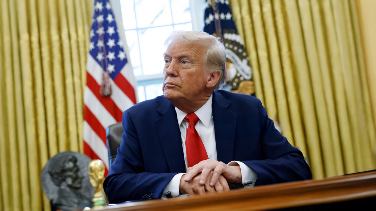 President Donald Trump sits in the Oval Office, White House.
